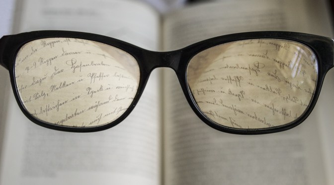 reading with glasses