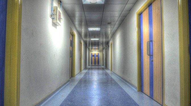 See the woman who filmed Gloucester hospital as being empty, being arrested