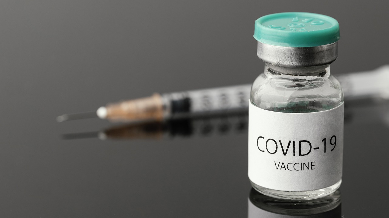 covid vaccine vial and syringe