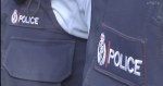 Two uniformed NZ Police showing just their logo