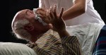 older gentleman being euthanized by covering his mouth