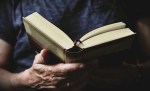 holding a book