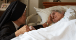 elderly woman with a Catholic Nun - euthanasia